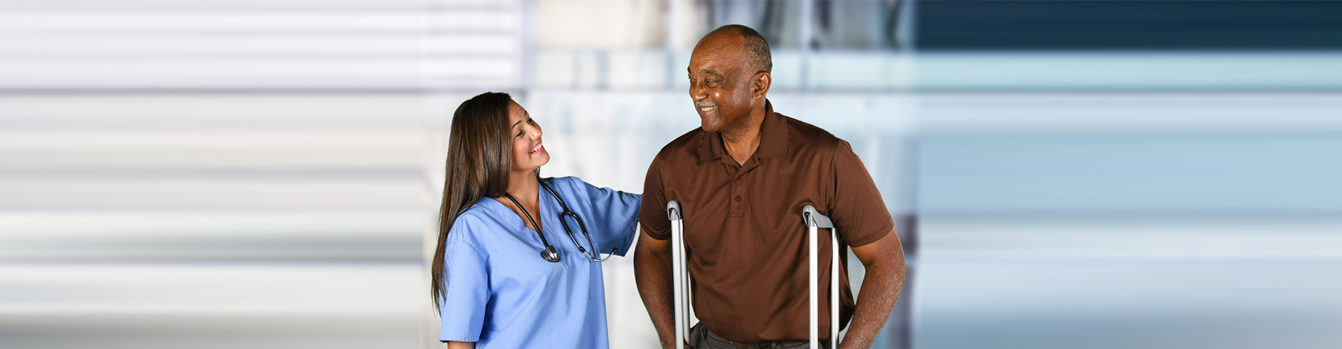 caretaker and old man in crutches